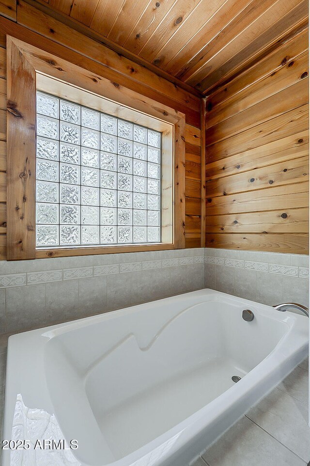2793 Canyon Ridge Rd, Overgaard, AZ 85933 - bathroom featuring wooden ceiling, wood walls, and a bathing tub