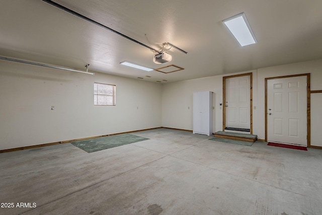 2793 Canyon Ridge Rd, Overgaard, AZ 85933 - garage featuring baseboards and a garage door opener