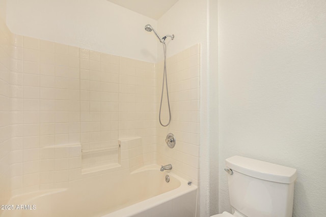 full bathroom featuring toilet and shower / tub combination