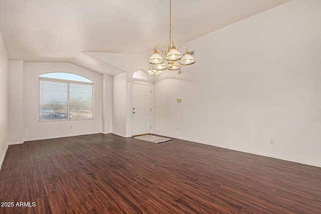 unfurnished room with dark wood-style floors, lofted ceiling, baseboards, and a chandelier