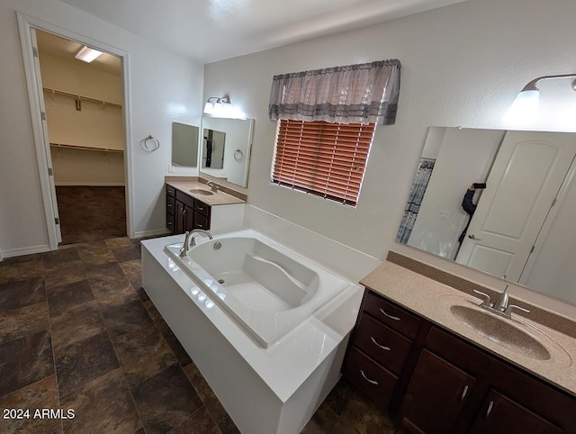 bathroom featuring vanity and a bathtub