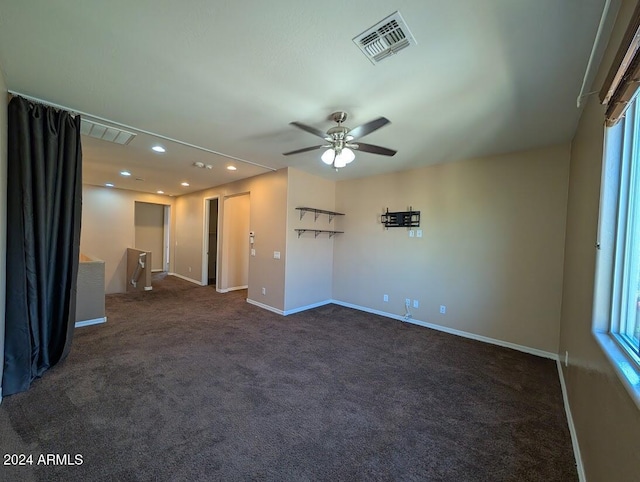 carpeted empty room with ceiling fan