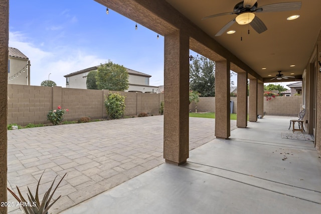 view of patio / terrace featuring ceiling fan