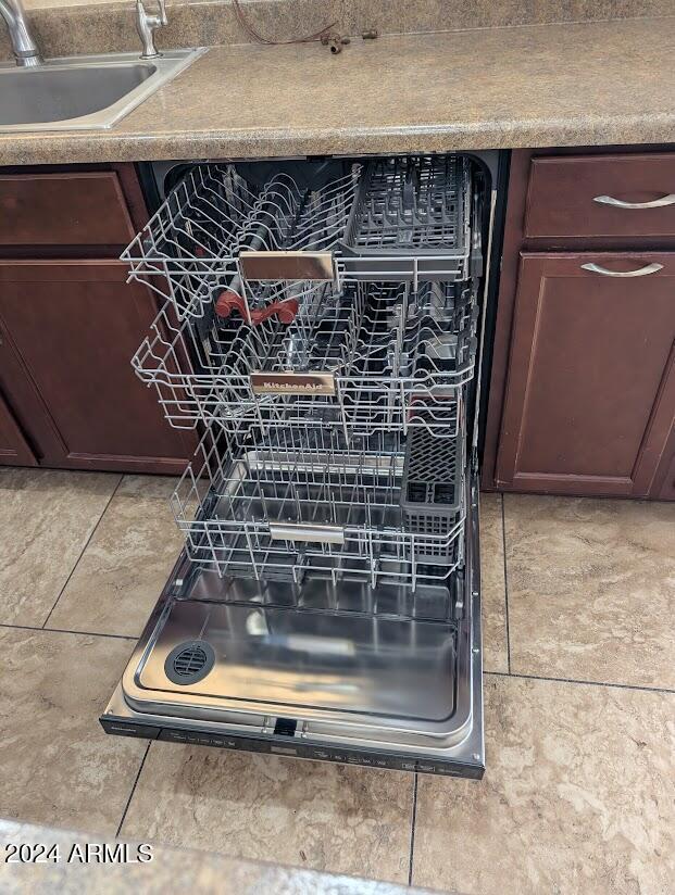 interior details featuring sink and dishwasher