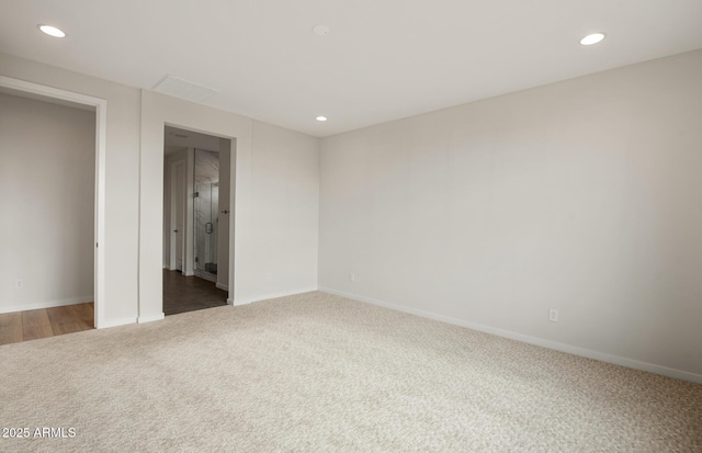 unfurnished bedroom with dark carpet