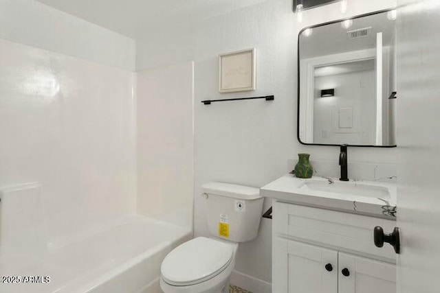 full bathroom featuring shower / washtub combination, vanity, and toilet