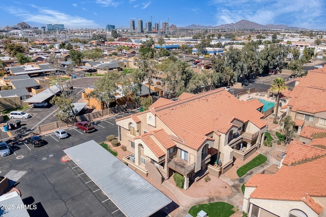 drone / aerial view featuring a city view