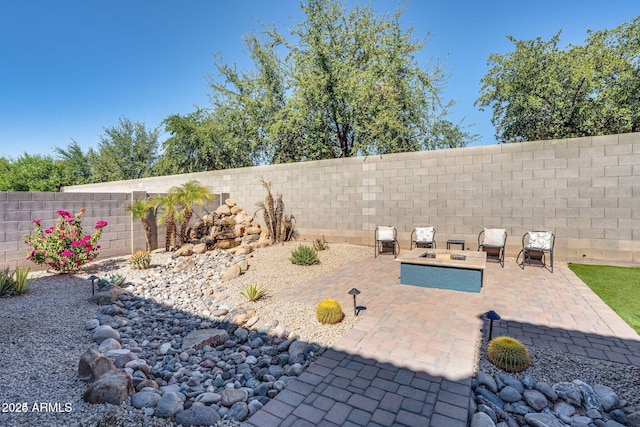 view of yard with a fenced backyard and a patio