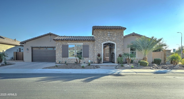 mediterranean / spanish-style house featuring a garage