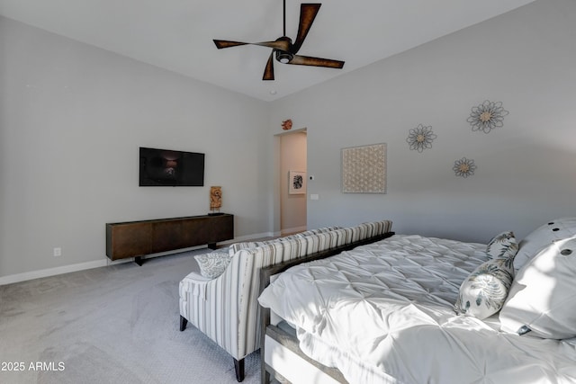 bedroom featuring light colored carpet and ceiling fan