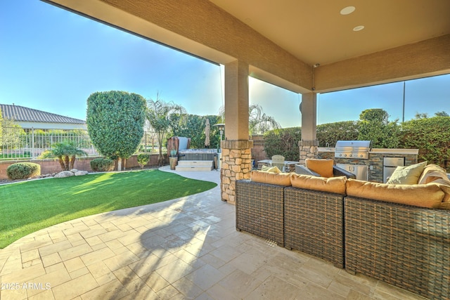 view of patio featuring an outdoor kitchen, grilling area, and an outdoor hangout area