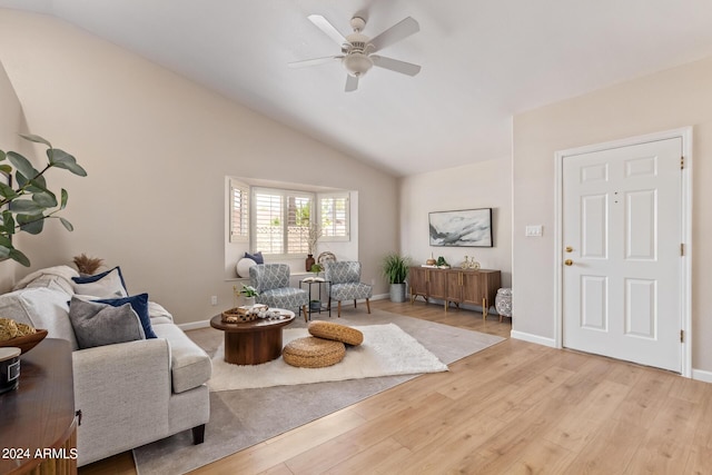 sitting room featuring ceiling fan, lofted ceiling, and light hardwood / wood-style floors