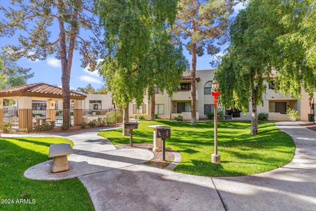 750 E Northern Ave Unit 1089, Phoenix, AZ 85020 - view of community featuring fence and a yard