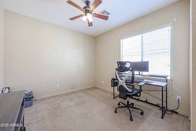 carpeted office with ceiling fan