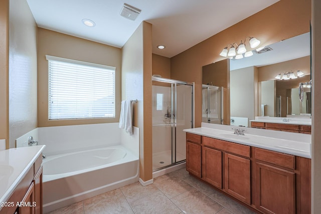 bathroom featuring vanity, tile patterned floors, and independent shower and bath