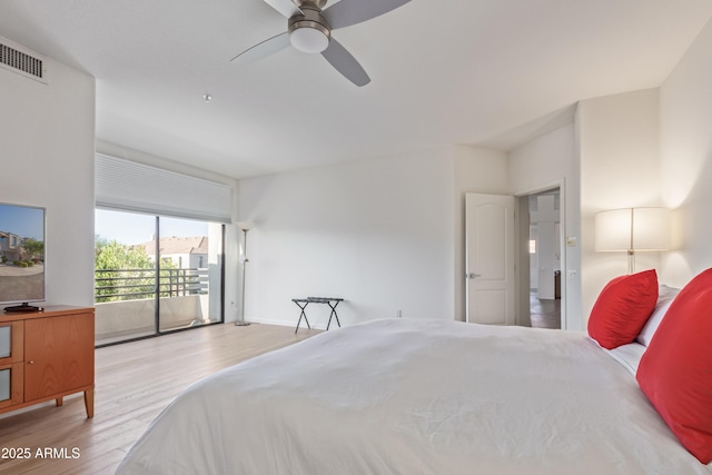 bedroom featuring access to outside, ceiling fan, and light hardwood / wood-style floors