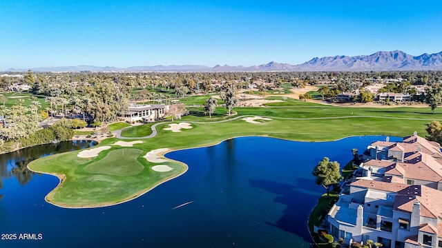 bird's eye view with a water and mountain view