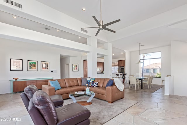 living room with ceiling fan