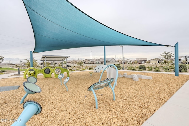 view of playground with a residential view