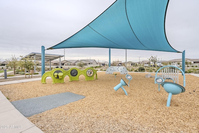 community jungle gym featuring a residential view