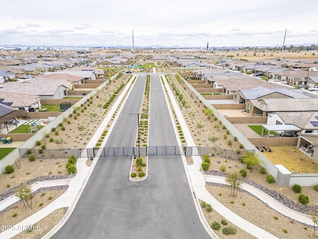 birds eye view of property with a residential view