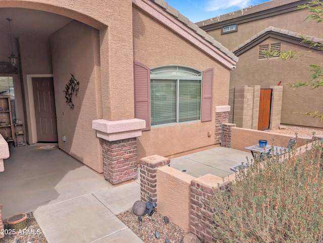 view of patio / terrace with fence