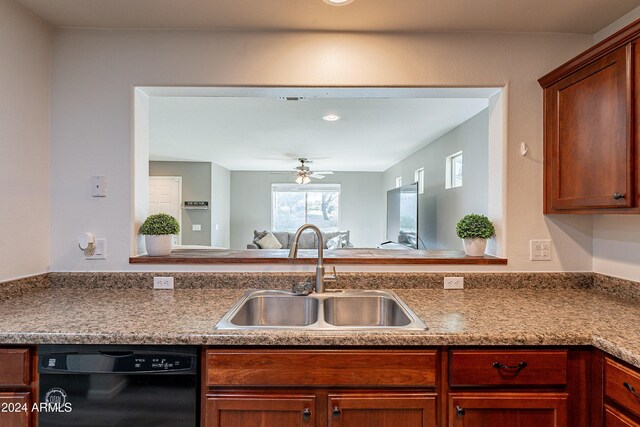 kitchen featuring ceiling fan, sink, and black dishwasher