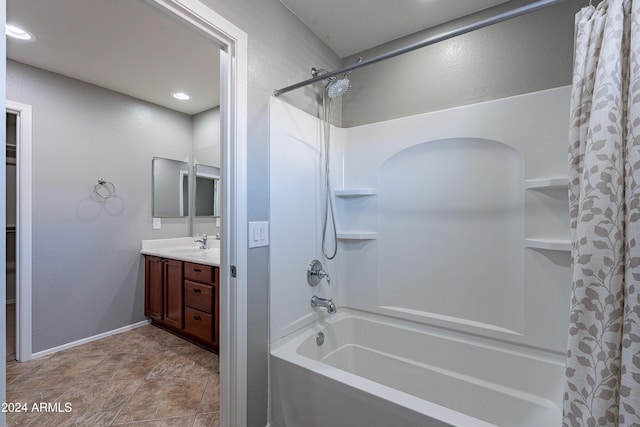 bathroom with vanity and shower / tub combo