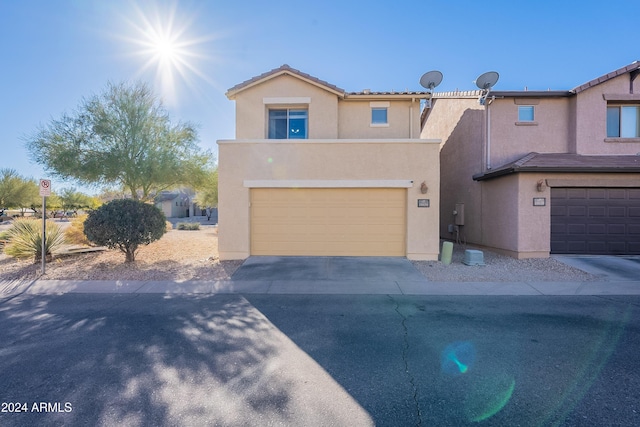 view of front of property with a garage