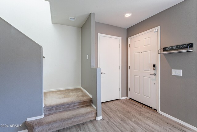 foyer entrance featuring light hardwood / wood-style flooring