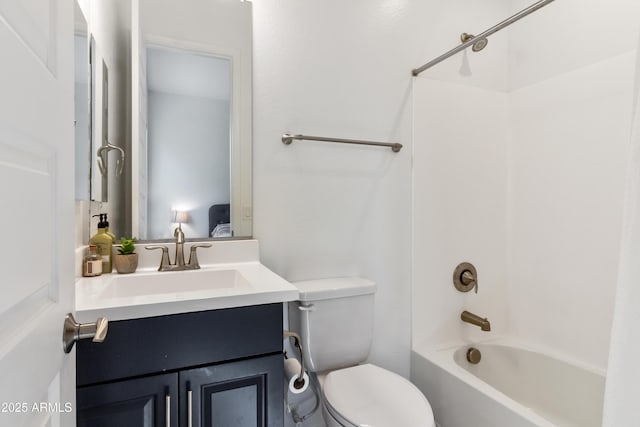 full bathroom with vanity, toilet, and washtub / shower combination