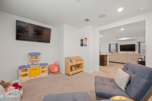 playroom with light carpet