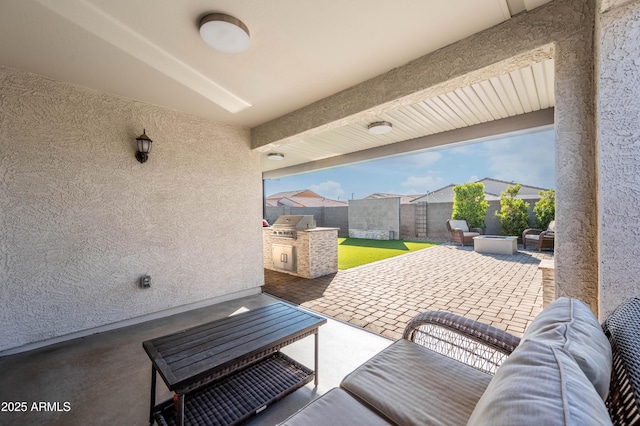 view of patio / terrace with grilling area, an outdoor hangout area, and area for grilling