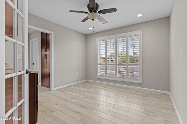 9917 W Cameo Dr, Sun City, AZ 85351 - spare room with light wood-style flooring, baseboards, a ceiling fan, and recessed lighting