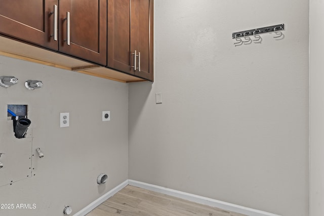 9917 W Cameo Dr, Sun City, AZ 85351 - laundry area with cabinet space, hookup for a gas dryer, light wood-style flooring, baseboards, and hookup for a washing machine