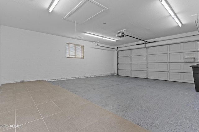 9917 W Cameo Dr, Sun City, AZ 85351 - garage featuring a garage door opener