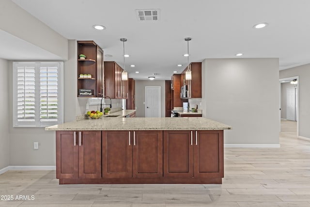 9917 W Cameo Dr, Sun City, AZ 85351 - kitchen featuring open shelves, a sink, stainless steel microwave, baseboards, and recessed lighting