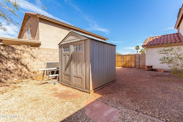 view of shed featuring a fenced backyard