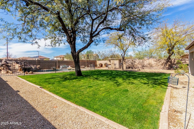 view of yard featuring a fenced backyard