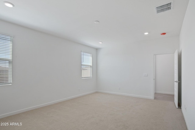 view of carpeted spare room