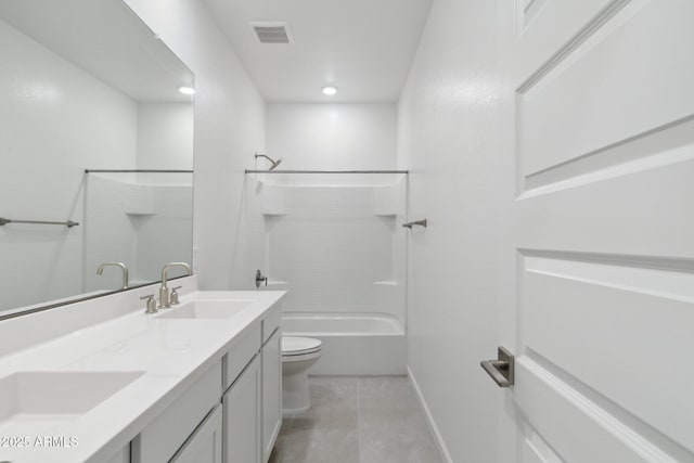 full bathroom featuring vanity, tile patterned flooring, tub / shower combination, and toilet