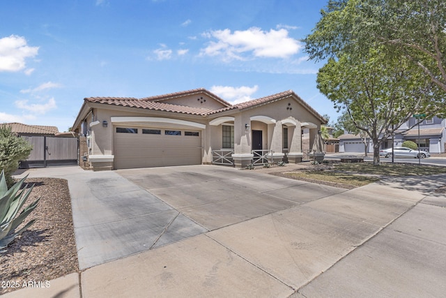 18998 E Lark Dr, Queen Creek, AZ 85142 - mediterranean / spanish-style house featuring stucco siding, driveway, an attached garage, and a tile roof