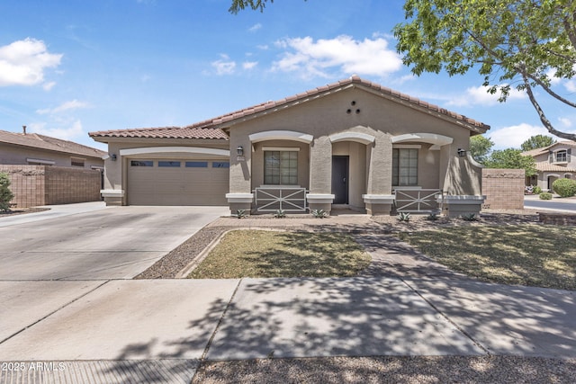 18998 E Lark Dr, Queen Creek, AZ 85142 - mediterranean / spanish-style house with stucco siding, a tile roof, covered porch, an attached garage, and concrete driveway