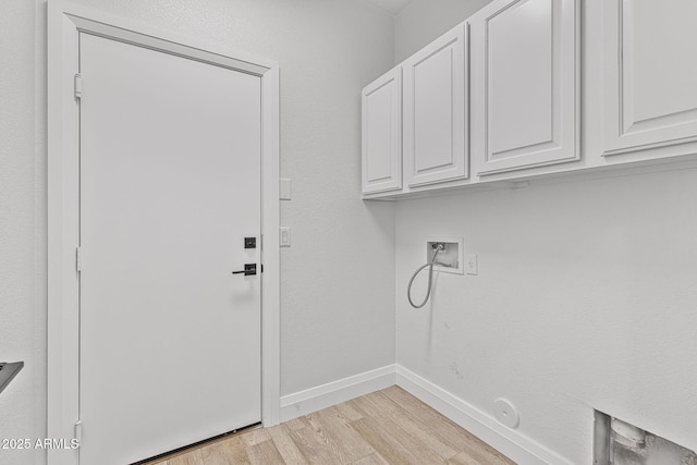 18998 E Lark Dr, Queen Creek, AZ 85142 - washroom featuring cabinet space, light wood-style floors, hookup for a washing machine, baseboards, and hookup for a gas dryer