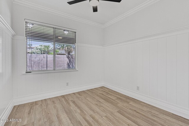 18998 E Lark Dr, Queen Creek, AZ 85142 - empty room with wood finished floors, a ceiling fan, crown molding, and baseboards