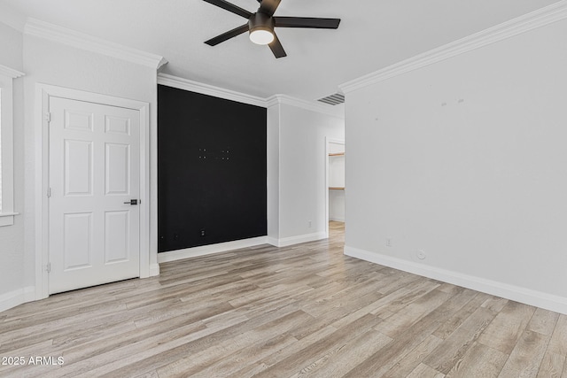 18998 E Lark Dr, Queen Creek, AZ 85142 - spare room featuring ceiling fan, light wood-style flooring, ornamental molding, and baseboards