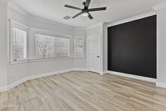 18998 E Lark Dr, Queen Creek, AZ 85142 - unfurnished bedroom with light wood-style floors, ornamental molding, baseboards, and ceiling fan
