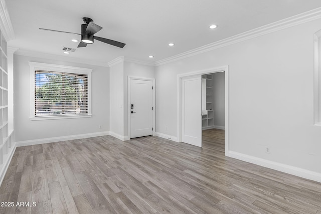 18998 E Lark Dr, Queen Creek, AZ 85142 - unfurnished room with ornamental molding, ceiling fan, wood finished floors, recessed lighting, and baseboards
