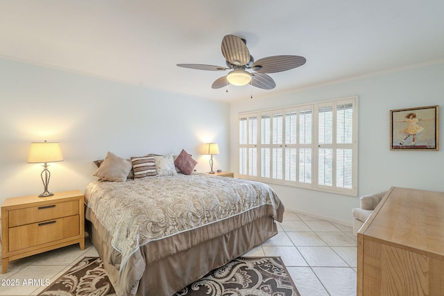 bedroom with light tile patterned floors, baseboards, crown molding, and a ceiling fan