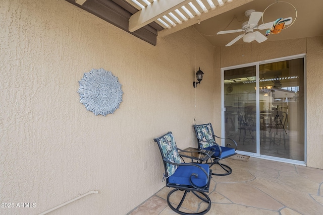 view of patio / terrace featuring a ceiling fan